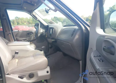 2003 Ford F-150 Lariat/Xlt z USA, uszkodzony, nr VIN 1FTRW08LX3KA83031